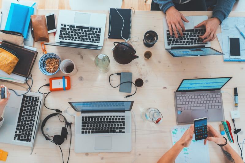 Team adapting to digital transformation with modern technology tools