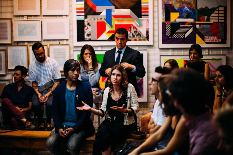 Modern coworking space with people working independently but together