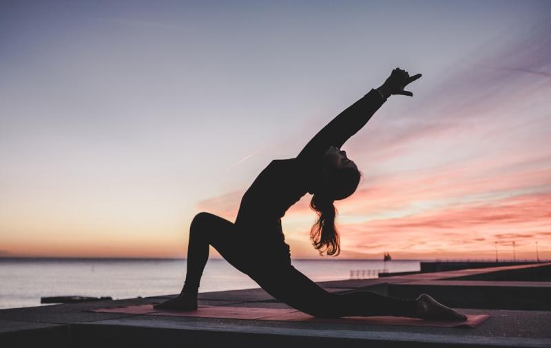 Person exercising outdoors as part of a healthy daily routine