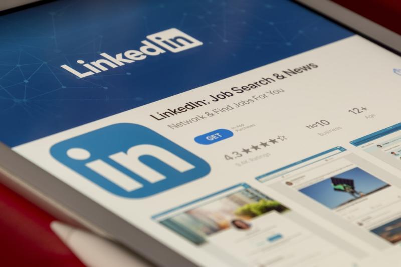 Professional LinkedIn profile displayed on a laptop screen