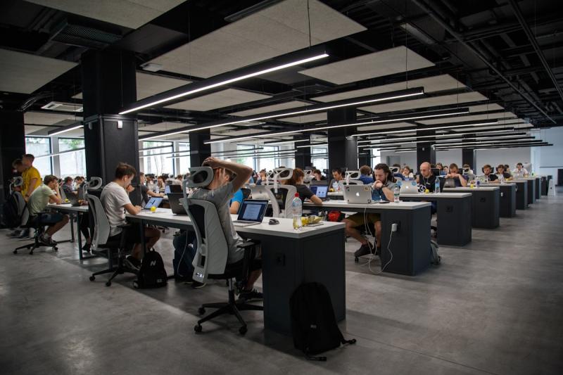 Focused professional working efficiently in a modern workspace