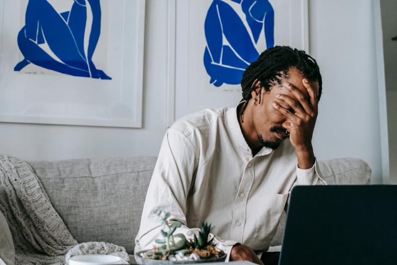 An independent worker feeling the weight of doing everything alone
