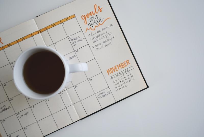 Well-organized planner with color-coded time blocks and task lists